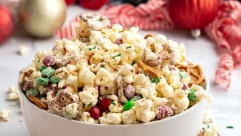 Colorful Christmas popcorn mix recipe for festive snacking