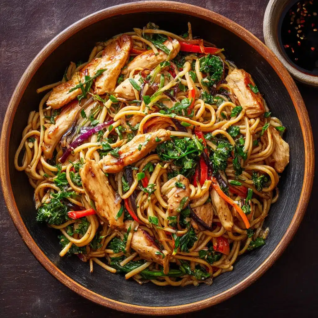 Delicious plate of Chicken Lo Mein with colorful vegetables and noodles