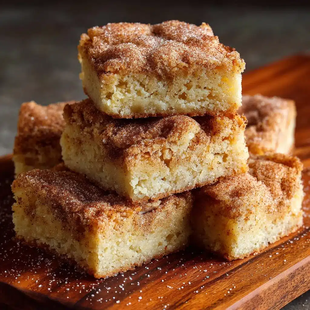 Freshly baked cinnamon sugar blondies on a cooling rack